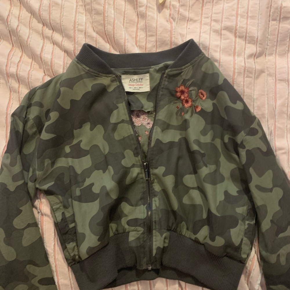 Camouflage this zip up jacket